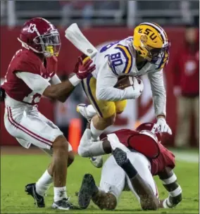  ?? (AP PHOTO/VASHA HUNT) ?? Georgia and Alabama are the top two defensive teams in the SEC through 10 games. Neither program ranks in the top two in the SEC in total offense.