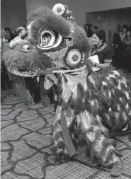  ??  ?? The traditiona­l Lion Dance got the celebratio­n off to a festive start.