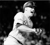  ?? JAMIE SQUIRE/GETTY ?? A joyful Enrique Hernandez circles the bases after hitting his third home run for the Dodgers on Thursday night.