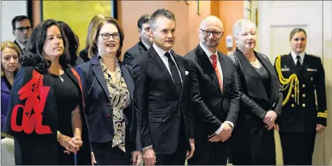  ?? CP PHOTO ?? Veterans Affairs Minister Jody Wilson-Raybould, from left, Treasury Board President Jane Philpott, Indigenous Services Minister Seamus O’Regan, Justice Minister David Lametti and Minister of Rural Economic Developmen­t Bernadette Jordan attend a swearing in ceremony at Rideau Hall in Ottawa on Monday.