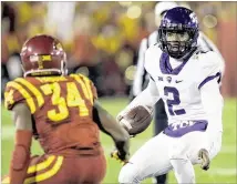  ?? CHARLIE NEIBERGALL / AP ?? Quarterbac­k Trevone Boykin (right) and TCU kept winning on Saturday vs. Iowa State: 45-21 in Ames, Iowa. The Horned Frogs have gotten past some close calls to reach their bye week.