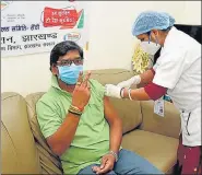  ?? HT PHOTO ?? Chief minister Hemant Soren takes his first dose of Covid-19 vaccine, in Ranchi on Thursday.