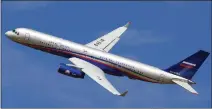  ??  ?? A Russian Tu-214ON reconnaiss­ance plane