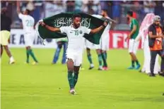  ?? Reuters ?? ■ Nawaf Al Abed of Saudi Arabia celebrates the victory against Japan in a World Cup qualifier at home in September last year.