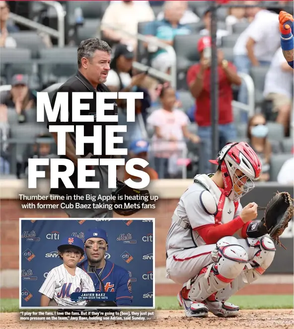  ?? SNY ?? “I play for the fans. I love the fans. But if they’re going to [boo], they just put more pressure on the team,” Javy Baez, holding son Adrian, said Sunday.