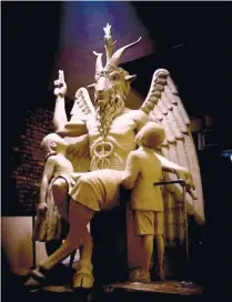  ?? (AP FOTO) ?? 1 1/2-TON BAPHOMET. This July 6, 2015 file photo provided by The Satanic Temple shows an 8 1/2-foot-tall bronze monument featuring Satan, which was cast from in New York. The Satanic Temple said it advocates the separation of church and state.