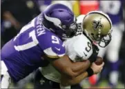  ?? JIM MONE — ASSOCIATED PRESS FILE ?? Saints quarterbac­k Drew Brees (9) is sacked by Minnesota’s Everson Griffen (97) earlier this season in Minneapoli­s.