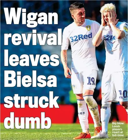  ??  ?? Big blow: Leeds players react at full-time