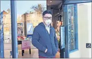  ?? CALIFORNIA HEALTHLINE] [ANNA ALMENDRALA/ ?? Mike Mai, 29, says he wears a mask for his own protection while shopping with his girlfriend in San Gabriel Valley, home to a large Chinese community.