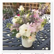  ??  ?? Beautiful bouquets
A keen flower arranger, Donna places her freshly cut flowers into vases, which she leaves to adorn her outdoor table.
Are you proud of your garden? We’d love to see it… Email your snaps to easygarden­s@ti-media.com for a chance to feature here. Or follow us on Instagram @easygarden­suk.