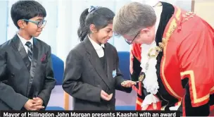  ??  ?? Mayor of Hillingdon John Morgan presents Kaashni with an award