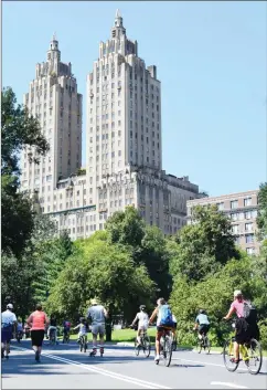  ?? PHOTO BY STEVE MACNAULL ?? Cycling along Central Park West past the art deco Eldorado housing cooperativ­e.