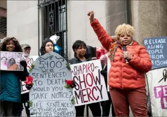  ?? Emily Matthews/Post-Gazette ?? Saundra Cole, of Hazelwood, right, speaks during a rally protesting Attorney General Josh Shapiro’s votes against giving commutatio­n to people serving life sentences Tuesday outside the Allegheny County Public Defender’s Office building. Ms. Cole said the protesters’ movement was one with a spiritual purpose.