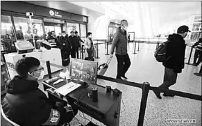  ??  ?? Staff members take passengers’ body temperatur­e at Tianhe Internatio­nal Airport in Wuhan, capital of central China’s Hubei Province, Jan. 21, 2020. The Chinese city Wuhan has taken a string of measures to tighten the control and monitoring of outbound travelers in an effort to curb the spread of new coronaviru­srelated pneumonia.(Photo:Xinhua)