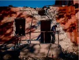  ?? DIMITAR DILKOFF/AFP VIA GETTY IMAGES ?? On Wednesday, workers removed debris from the maternity unit of a hospital in southern Ukraine after Russian shelling.