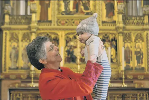  ?? PICTURE: TONY JOHNSON ?? CELEBRATIO­N: The Rt Rev Guli Francis-Dehqani with baby Jesus Mohsen at a Persian language translatio­n of the Holy Communion service at Wakefield Cathedral.