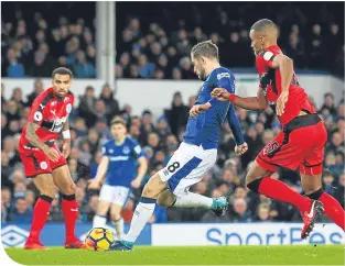  ??  ?? Gylfi Sigurdsson fires Everton into an early second-half lead at Goodison Park