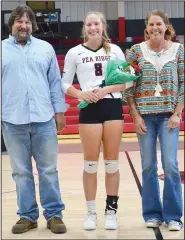 ?? (NWA Democrat-Gazette/Annette Beard) ?? Pea Ridge senior volleyball player Dallice White was escorted Oct. 14 by her parents, Merrill and Darcy White, during the team’s final home game.