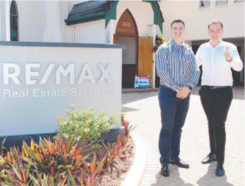  ??  ?? Ray and David Murphy mark the first anniversar­y of owning RE/MAX Real Estate Services.