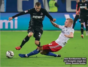  ??  ?? Kein Durchkomme­n: Rick van Drongelen stoppt den Kölner Dominik Drexler.