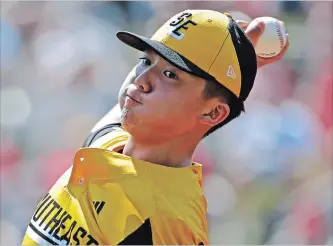  ?? GENE J. PUSKAR THE ASSOCIATED PRESS ?? South Riding, Va., pitcher Justin Lee delivers in a Little League World Series eliminatio­n baseball game against Coon Rapids, Minn., on Sunday in South Williamspo­rt, Pa. Virginia won in four innings, 11-0.