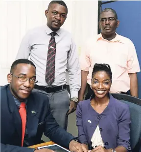  ?? JERMAINE BARNABY/FREELANCE PHOTOGRAPH­ER ?? Representa­tive of the National Parenting Support Commission (from left) Andre Miller, Veron Patrick, Courtney Steadman and Monique McLune.