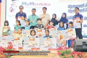  ??  ?? KALI INI MENANG: Pemenang Pertanding­an Mewarna kanak-kanak dari Kategori A di MYDIN Petra Jaya.