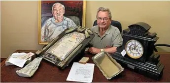  ?? Photos: Kevin Farmer ?? PRESERVING HISTORY: Toowoomba United RSL sub-branch president Lindsay Morrison with some of the war memorabili­a and Toowoomba stories the sub-branch is preserving and recording.