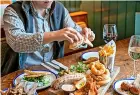  ?? ?? Butcombe is hoping to reduce food waste in its pubs using an app