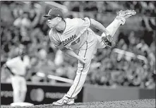  ?? AP/LYNNE SLADKY ?? Brandon Kintzler went from the Minnesota Twins’ staff, to feeding the animals at the San Diego Zoo Safari Park, to a spot in the Washington Nationals’ bullpen.