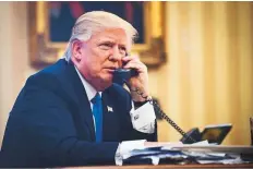  ?? Rex Features ?? United States President Donald Trump speaks on the phone with then prime minister of Australia, Malcolm Turnbull, in the Oval Office.