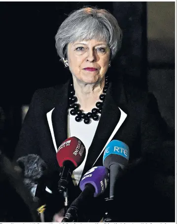  ??  ?? Theresa May speaks outside Stormont House in Belfast after she emerged from “full and frank discussion­s with the five parties”