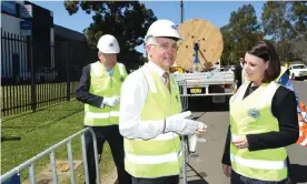  ?? Photograph: Mick Tsikas/AAP ?? Malcolm Turnbull ordered a review into the NBN in 2013 which led to changes to the Labor plan to roll out fibre-to-the-premises for 93% of homes.