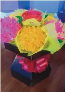  ?? COURTESY OF Q’S CAKES AND SWEETS BOUTIQUE ?? This bouquet cupcake is available from Q’s Cakes and Sweets Boutique for Valentine’s Day.