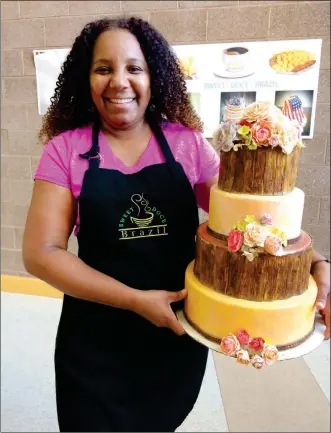  ??  ?? with the AWC Small Business Developmen­t Center, Regiane Johnson, owner of Sweet Doce Brazil Cafe, says she learned “everything” about running a business. Her cafe is now located inside the Yuma Main Library.