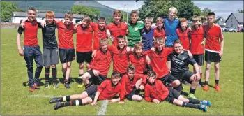  ?? 01_B25footbal­l02 ?? The Arran High School S1/2 team celebrate after winning the trophy.