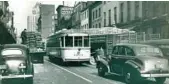  ?? BALTIMORE SUN ?? A No. 19 streetcar heads north along Hanover Street between Pratt and Lombard in 1941.