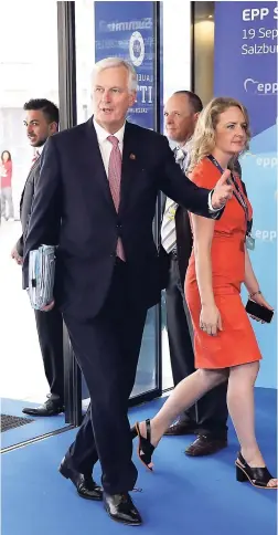  ?? AP ?? EU chief Brexit negotiator Michel Barnier (foreground) arrives at the informal EU summit in Salzburg, Austria, on Wednesday, September 19.