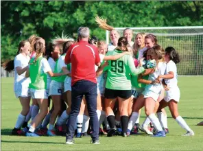  ?? TONY LENAHAN/THE Saline Courier ?? The Bryant Lady Hornets celebrate Friday after defeating Conway 2-1 to capture the 6A State Championsh­ip.