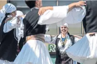  ?? TARA WALTON/TORONTO STAR FILE PHOTO ?? Members of the Levendia-X greek dance group perform Saturday afternoon during the 2013 Taste of the Danforth.