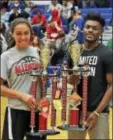  ?? JOHN BLAINE — FOR THE TRENTONIAN ?? Allentown’s Ryan Weise, left, and Hightstown’s Jamal Anderson, right, pose with their trophies after winning the girls and boys 3-Point Shootouts at the WBCB Sunshine Foundation event at TCA on Thursday night.