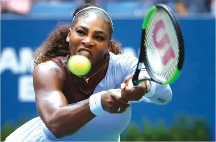  ??  ?? Serena Williams returns a shot to Kaia Kanepi, of Estonia