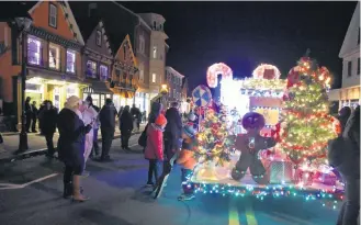  ??  ?? Lights, decoration­s, music and more were all part of the festive fun during the Candy Cane Lane Festival in Yarmouth.