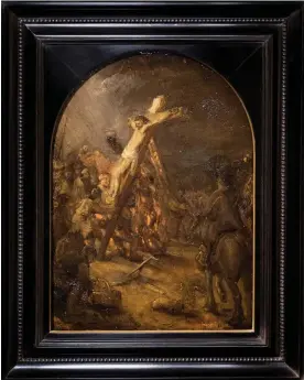  ?? ?? The Raising of the Cross is on display in the Bredius museum after art experts confirmed it was a genuine Rembrandt, not a fake as previously thought. Photograph: Koen van Weel/EPA