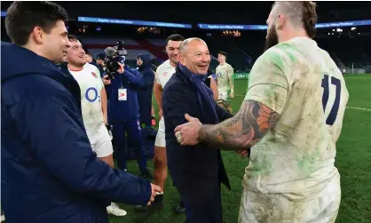  ??  ?? Eddie Jones shakes hands with Joe Marler after England beat France to win the Autumn Nations Cup. Photograph: Dan Mullan/The RFU Collection/Getty Images