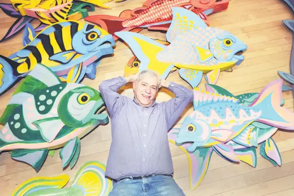  ?? File photo ?? Redding artist James Grashow and his cardboard fish sculptures, which were in his “Corrugated World” exhibit. Now an example from his early career is on view at the Met.