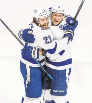  ?? AP ?? Tampa Bay’s Ondrej Palat celebrates his goal with Brayden Point on Wednesday.