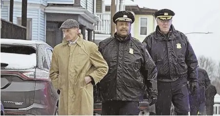  ?? STAFF FILE PHOTO BY MARK GARFINKEL ?? FOLLOWING HIS PATH: Police, including Commission­er William B. Evans, far left, and Superinten­dent-in-Chief William G. Gross, center, work on the scene of a shooting in 2015 in Mattapan. Gross will take over Evans’ post next month.