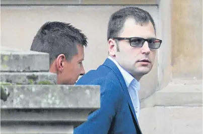  ??  ?? Vygantas Gadeikis, being escorted at Dundee Sheriff Court, was found guilty of attempting to abduct two women on a Dundee street.