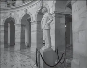  ?? AP Photo/J. Scott Applewhite ?? Memorial: A statue of Sen. Richard Russell of Georgia stands in the rotunda of a Senate office building named after him, on Capitol Hill in Washington, Monday, After the death of Sen. John McCain of Arizona this weekend, Senate Democratic leader Chuck Schumer said he will introduce a resolution to rename the Russell Senate Office Building to honor McCain.